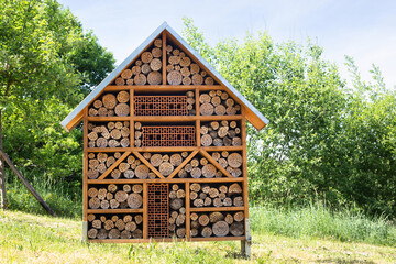 Wooden insect hotel, habitat for bugs and bees, rescue house, environment and ecology conversation,...