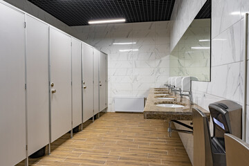 New public toilets partitioned into rooms and sinks