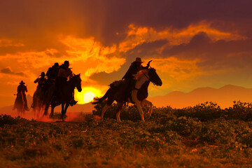 Group of Cowboy riding horse.