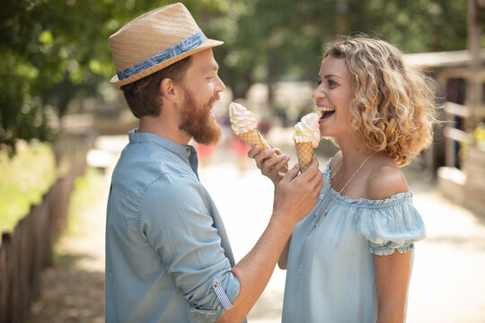 Beautiful Young Couple Having An Ice Cream