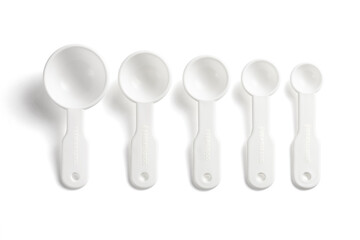 White measuring spoons isolated on a while