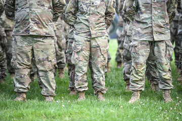 Detail shot with american soldiers in military standing position during ceremony