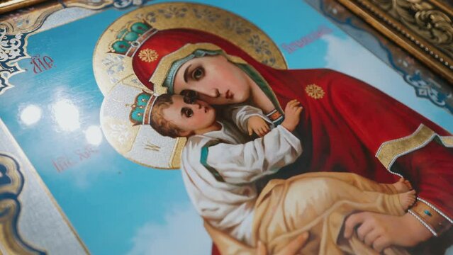  Icon of the Mother of God with the baby Jesus in her arms. Element of the interior of a religious temple. The holy picture