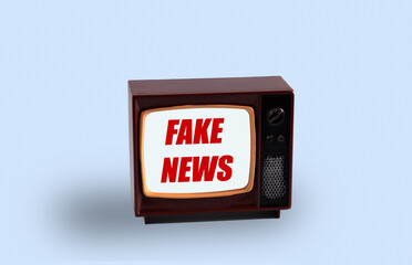 Vintage TV with inscription fake news on blue background.