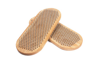 Sadhu board isolated on white background. The practice of standing on nails. Yoga concept.