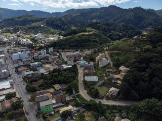 Fototapeta na wymiar small and organized country town with lots of vegetation, aerial drone view, Venda Nova do Imigrante, Espirito Santo, Brazil
