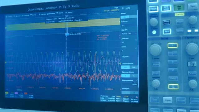 Sinusoid or harmonic oscillations with random amplitude on a graph on the screen of a device for scientific, industrial use for accurate measurement of various processes in chemistry, physics. Closeup