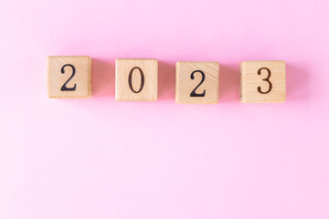 New year 2023 on wooden cubes. Wooden cube with 2022 to 2023 year. Start new year 2023 with goal plan, goal concept, action plan, strategy, new year business vision.