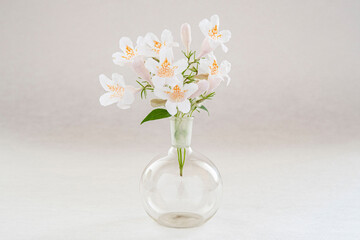 Bouquet of white flowers in a glass vase