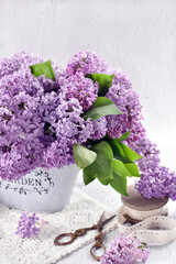 Bunch of purple lilac on the table