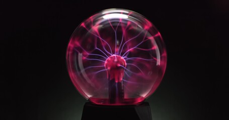 Tesla coil inside glass sphere closeup