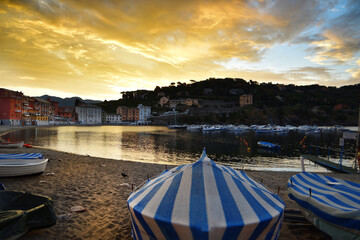 Spectacular sunrise over the Bay of Silence in Sestri Levante, Liguria