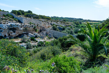 Fototapeta na wymiar Roman tombs and necropolis in the region of Bingemma in Malta.