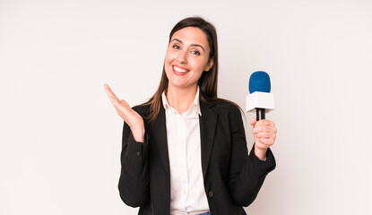 young adult pretty woman feeling happy, surprised realizing a solution or idea. presenter with a...