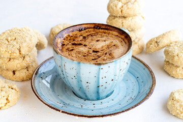 Coffee and cookie. Flour cookies on a white background. Flour cookies with coffee on the side. close-up