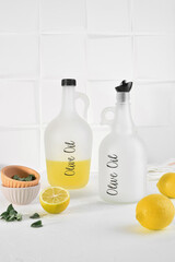 bottle of olive oil and lemon
