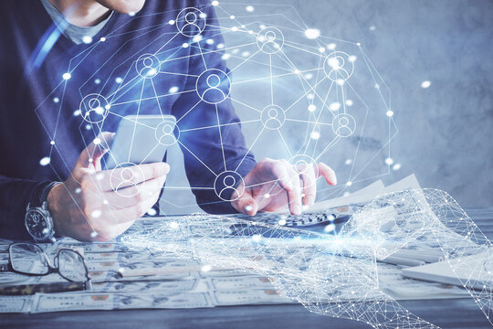 Double exposure of man's hands holding and using a phone and social network theme drawing.