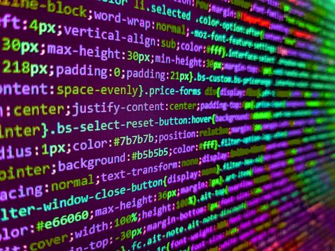 Matrix byte of binary data rian code running abstract background in dark blue digital style. PHP development, software site code