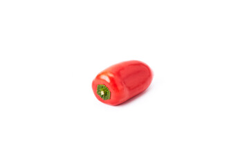 Small red peppers on a white background. Healthy food