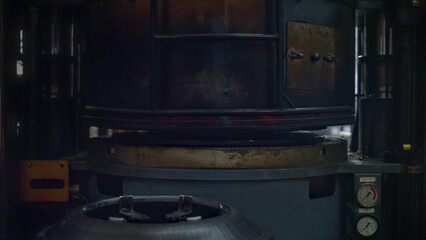 Factory tire manufacturing machine stamping new production at modern workshop