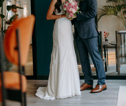 young bride and groom together, wedding photo