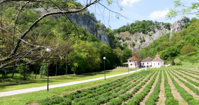 Beutiful spring nature landscape. Rural scenic view. Serbian Orthodox Church, Vratna Monastery, 14th century, in the village of Vratna in Negotin, Serbia.  4K video footage.	