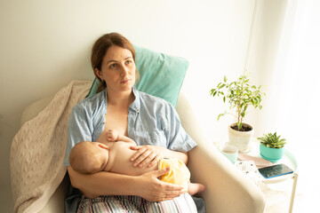 The young mom wants to breastfeed her newborn baby