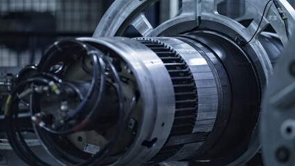 Fototapeta premium Detailed rubber tyre production automat with wires in technological factory