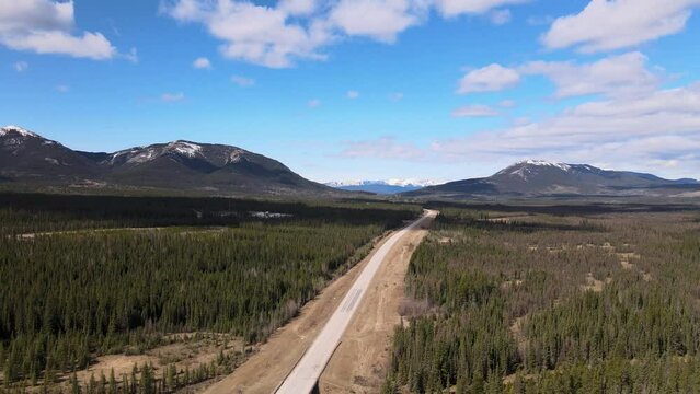 Aerial View Of Highway and Snow Top Mountains Near Nordegg Alberta Cananda