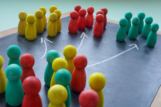 Colored figures and arrows as a symbol Market segmentation.