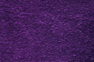 Dark purple old textured plaster surface. Color rough texture. Violet abstract background