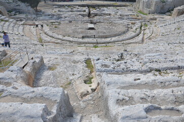 Photo of a beautiful Greek amphitheatre under the warm sun of Sicily