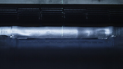 Closeup rubber tire tape rotating on technological modern manufacture machine