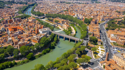 Obraz premium Aerial view of Tiber Island, the only river island in the part of the Tiber which runs through Rome, Italy. In the period of ancient Rome, the temple of Asclepius stood here
