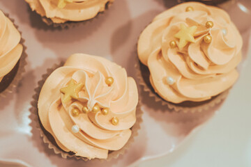 cupcakes with cream and chocolate