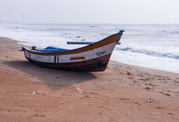 View of the fisherman boat along the coastline of bay of bengal, Tamil Nadu, India - obrazy, fototapety, plakaty