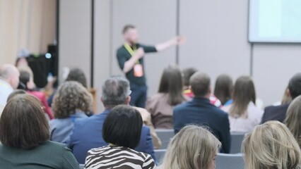 Audience listens to the lecturer at the conference