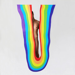 a muscular man stands behind the upside down arch with rainbow pattern, concept of LGBTQ pride,...