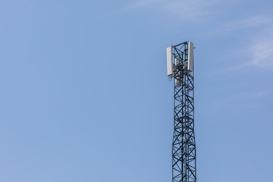 Cell Phone Tower on a day with blue sky