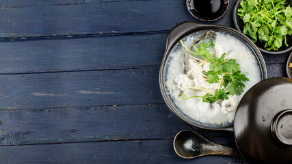 Chinese cuisine; Congee with fish slices in casserole
