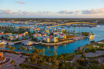 Harborside Villas aerial view at Nassau Harbour with Nassau downtown at the background at sunset,...