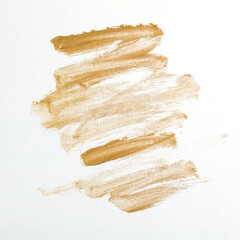 Gold metallic makeup streaks for beauty or luxury concept, isolated on white background.