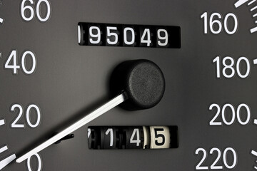 odometer of used car showing mileage of 195049 km