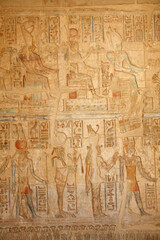 Fototapeta na wymiar Wall reliefs inside the Ptolemaic Temple of Hathor at Deir el Medina