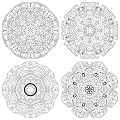 Hand drawn zentangle set of 4 mandalas for coloring page.