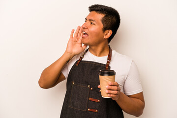 Restaurant hispanic waiter holding a take away coffee isolated on white background shouting and holding palm near opened mouth.