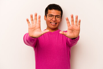 Young hispanic man isolated on white background showing number ten with hands.
