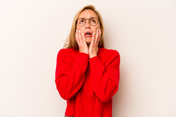 Young caucasian woman isolated on white background whining and crying disconsolately.