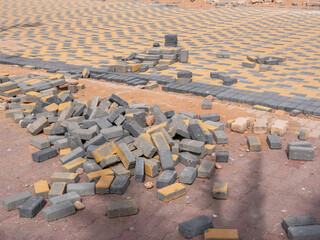 Repair of the walking area in the city. Covering sidewalks with paving stones.