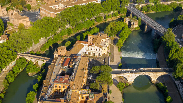 Aerial view of Tiber Island, the only river island in the part of the Tiber which runs through Rome, Italy. In the period of ancient Rome, the temple of Asclepius stood here